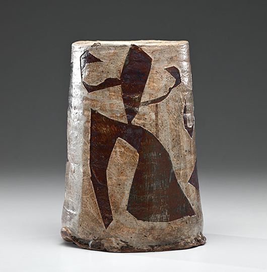 In the mid-1950s, Voulkos experimented with using stencils to created raised abstract figural designs in the glaze of his pots. This signed 1957 vase, which had been exhibited at the potter’s 1995 retrospective in Japan, sold for $24,000 at Cowan’s in May. Courtesy Cowan’s+Clark+Delvecchio Auctions